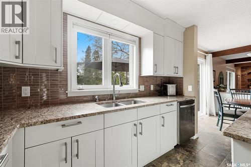 7 Cowie Road, Regina, SK - Indoor Photo Showing Kitchen With Double Sink