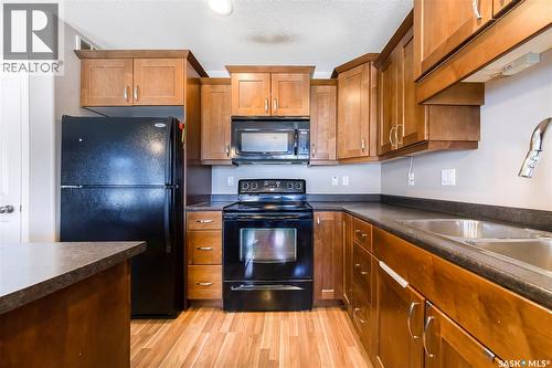 2 547 East Hampton Boulevard, Saskatoon, SK - Indoor Photo Showing Kitchen With Double Sink