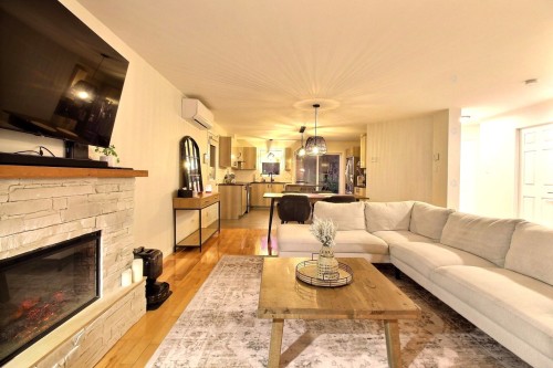 Salon - 208 Av. Roy, Saint-Jules, QC - Indoor Photo Showing Living Room With Fireplace