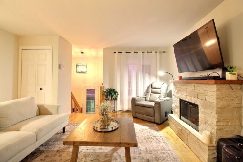 Salon - 208 Av. Roy, Saint-Jules, QC - Indoor Photo Showing Living Room With Fireplace