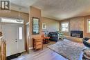 97 Compton Road, Regina, SK  - Indoor Photo Showing Living Room With Fireplace 