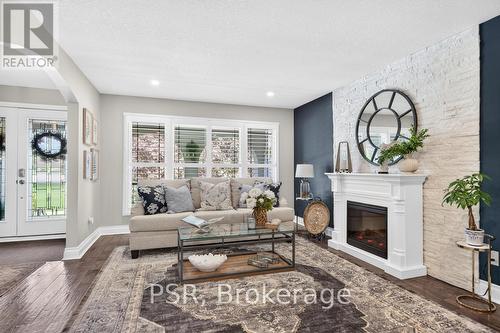 323 Queen Victoria Drive, Hamilton, ON - Indoor Photo Showing Living Room With Fireplace