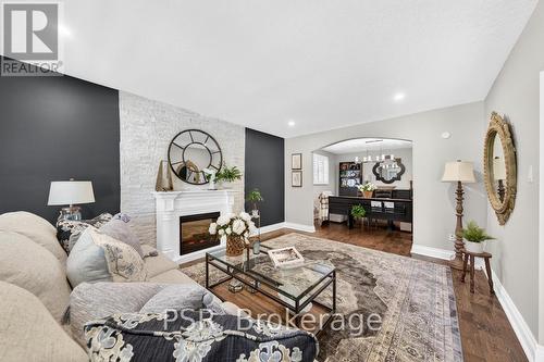323 Queen Victoria Drive, Hamilton, ON - Indoor Photo Showing Living Room With Fireplace