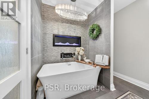 323 Queen Victoria Drive, Hamilton, ON - Indoor Photo Showing Bathroom With Fireplace