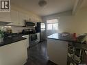 3 2060 Lorne Street, Regina, SK  - Indoor Photo Showing Kitchen With Double Sink 