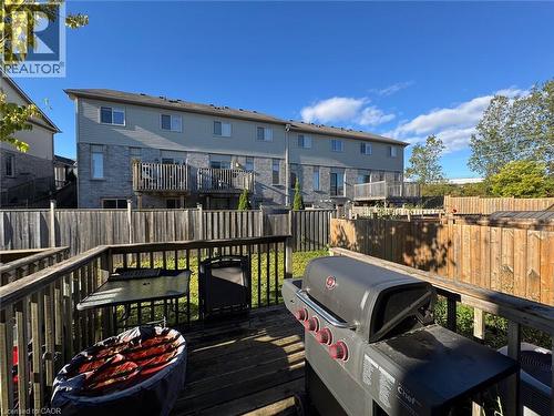 Elevated wooden deck with perimeter railing - 517 Northbrook Place, Kitchener, ON - Outdoor With Deck Patio Veranda With Exterior