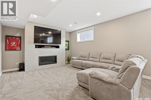 4264 Elderberry Crescent E, Regina, SK - Indoor With Fireplace