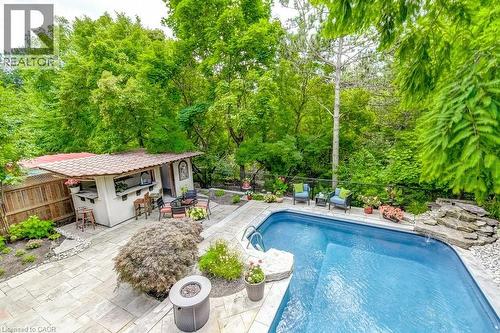 2080 Mckerlie Crescent, Burlington, ON - Outdoor With In Ground Pool With Deck Patio Veranda With Backyard