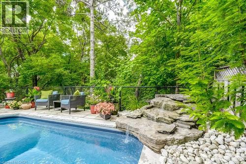 2080 Mckerlie Crescent, Burlington, ON - Outdoor With In Ground Pool With Deck Patio Veranda With Backyard