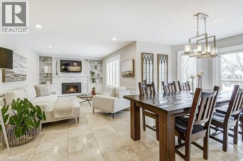 2080 Mckerlie Crescent, Burlington, ON - Indoor Photo Showing Dining Room With Fireplace