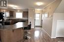 102 1022 Hampton Circle, Saskatoon, SK  - Indoor Photo Showing Kitchen With Double Sink 
