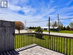 Front deck area offers main floor entry as well. - 