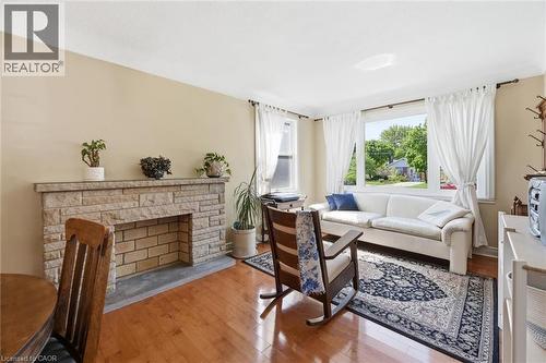 93 Sunning Hill Avenue, Hamilton, ON - Indoor Photo Showing Living Room With Fireplace