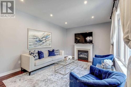 Upper - 134 Ascalon Drive, Vaughan, ON - Indoor Photo Showing Living Room With Fireplace