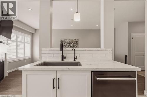 All light fixtures included in sale. - 81 Beasley Grove, Ancaster, ON - Indoor Photo Showing Kitchen