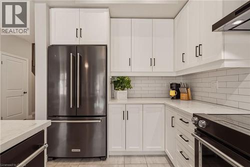 Stainless steel appliances included. - 81 Beasley Grove, Ancaster, ON - Indoor Photo Showing Kitchen