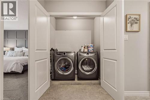 2nd level washer/ dryer. - 81 Beasley Grove, Ancaster, ON - Indoor Photo Showing Laundry Room