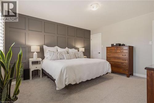 Beautiful feature wall in primary. - 81 Beasley Grove, Ancaster, ON - Indoor Photo Showing Bedroom