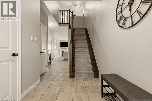 Upgraded staircase. - 81 Beasley Grove, Ancaster, ON - Indoor Photo Showing Other Room