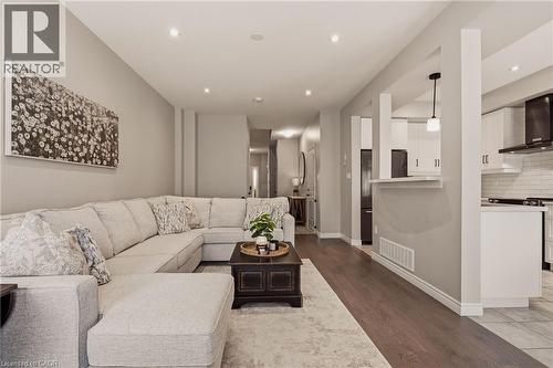 Sightlines through the main floor. - 81 Beasley Grove, Ancaster, ON - Indoor Photo Showing Living Room