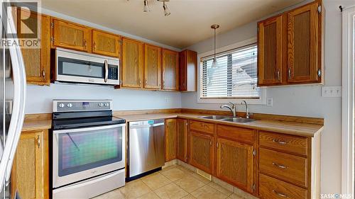 1134 Brown Street, Regina, SK - Indoor Photo Showing Kitchen With Double Sink