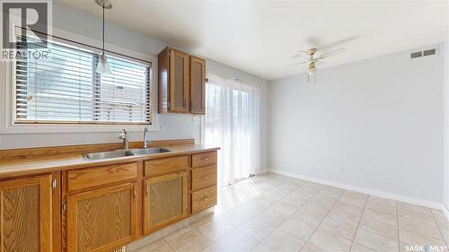 1134 Brown Street, Regina, SK - Indoor Photo Showing Kitchen With Double Sink