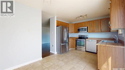 1134 Brown Street, Regina, SK - Indoor Photo Showing Kitchen With Double Sink