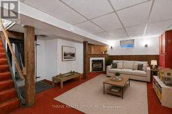 VIRTUALLY STAGED - BASEMENT REC ROOM - 