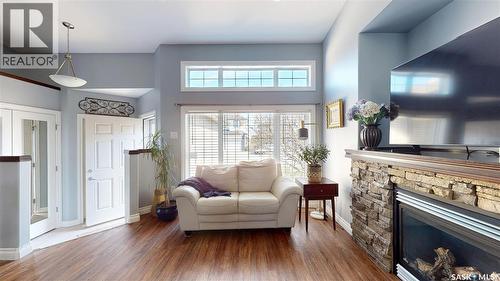 5053 Watson Way, Regina, SK - Indoor Photo Showing Living Room With Fireplace