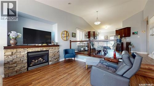 5053 Watson Way, Regina, SK - Indoor Photo Showing Living Room With Fireplace