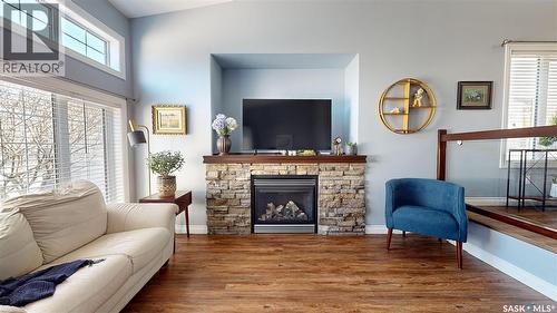 5053 Watson Way, Regina, SK - Indoor Photo Showing Living Room With Fireplace