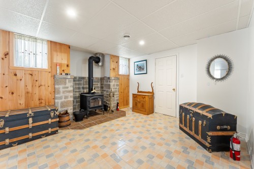 Salle familiale - 664 Av. Stéphane, Magog, QC - Indoor With Fireplace