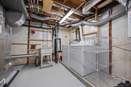 Salle de lavage - 3 Rue Cartier, Vaudreuil-Dorion, QC - Indoor Photo Showing Basement