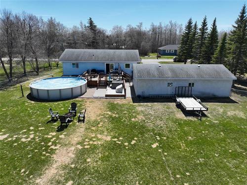 88 Second Avenue Sw, Teulon, MB - Outdoor With Above Ground Pool With Backyard