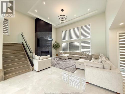 7 Cypress Pointe, Leamington, ON - Indoor Photo Showing Living Room With Fireplace