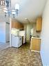 305 1110 9Th Avenue Ne, Swift Current, SK  - Indoor Photo Showing Kitchen 