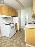 305 1110 9Th Avenue Ne, Swift Current, SK  - Indoor Photo Showing Kitchen 