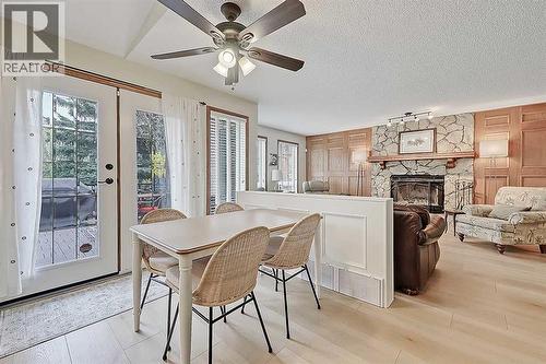 42 Sundown Close Se, Calgary, AB - Indoor With Fireplace