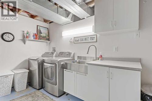 42 Sundown Close Se, Calgary, AB - Indoor Photo Showing Laundry Room