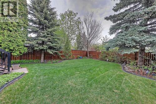 42 Sundown Close Se, Calgary, AB - Outdoor With Backyard