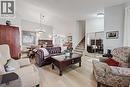 42 Sundown Close Se, Calgary, AB  - Indoor Photo Showing Living Room 