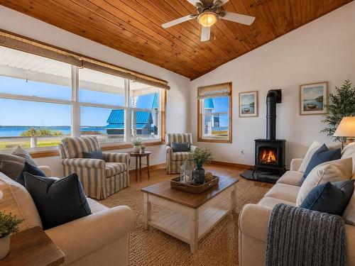 212 Basinview Crescent, Darnley, PE - Indoor Photo Showing Living Room With Fireplace
