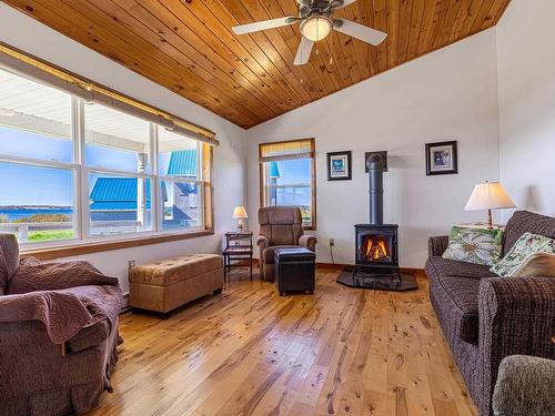 212 Basinview Crescent, Darnley, PE - Indoor Photo Showing Living Room With Fireplace