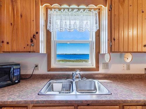 212 Basinview Crescent, Darnley, PE - Indoor Photo Showing Kitchen With Double Sink