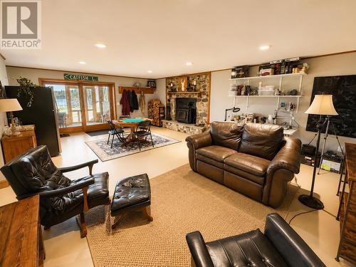 22 Catfish Rd, Wawa, ON - Indoor Photo Showing Living Room With Fireplace