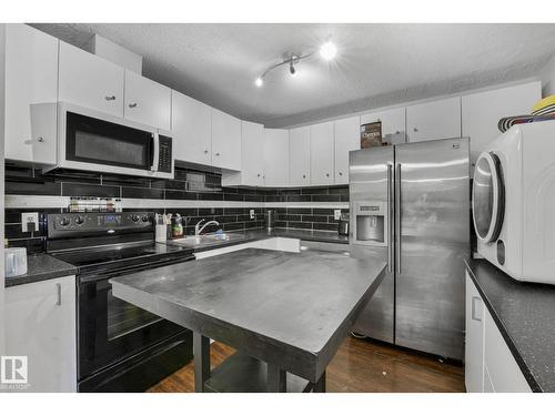 #A7 2808 116 St Nw, Edmonton, AB - Indoor Photo Showing Kitchen