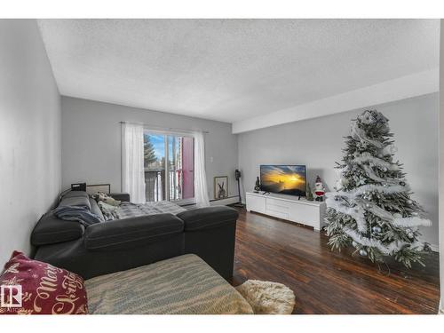 #A7 2808 116 St Nw, Edmonton, AB - Indoor Photo Showing Living Room