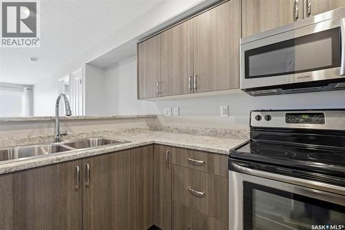 209 915 Kristjanson Road, Saskatoon, SK - Indoor Photo Showing Kitchen With Double Sink