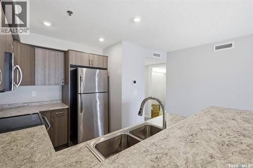 209 915 Kristjanson Road, Saskatoon, SK - Indoor Photo Showing Kitchen With Double Sink