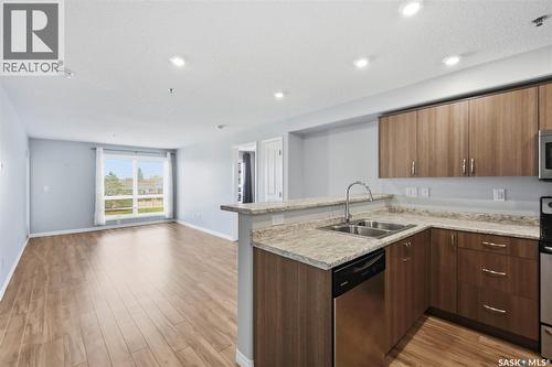 209 915 Kristjanson Road, Saskatoon, SK - Indoor Photo Showing Kitchen With Double Sink